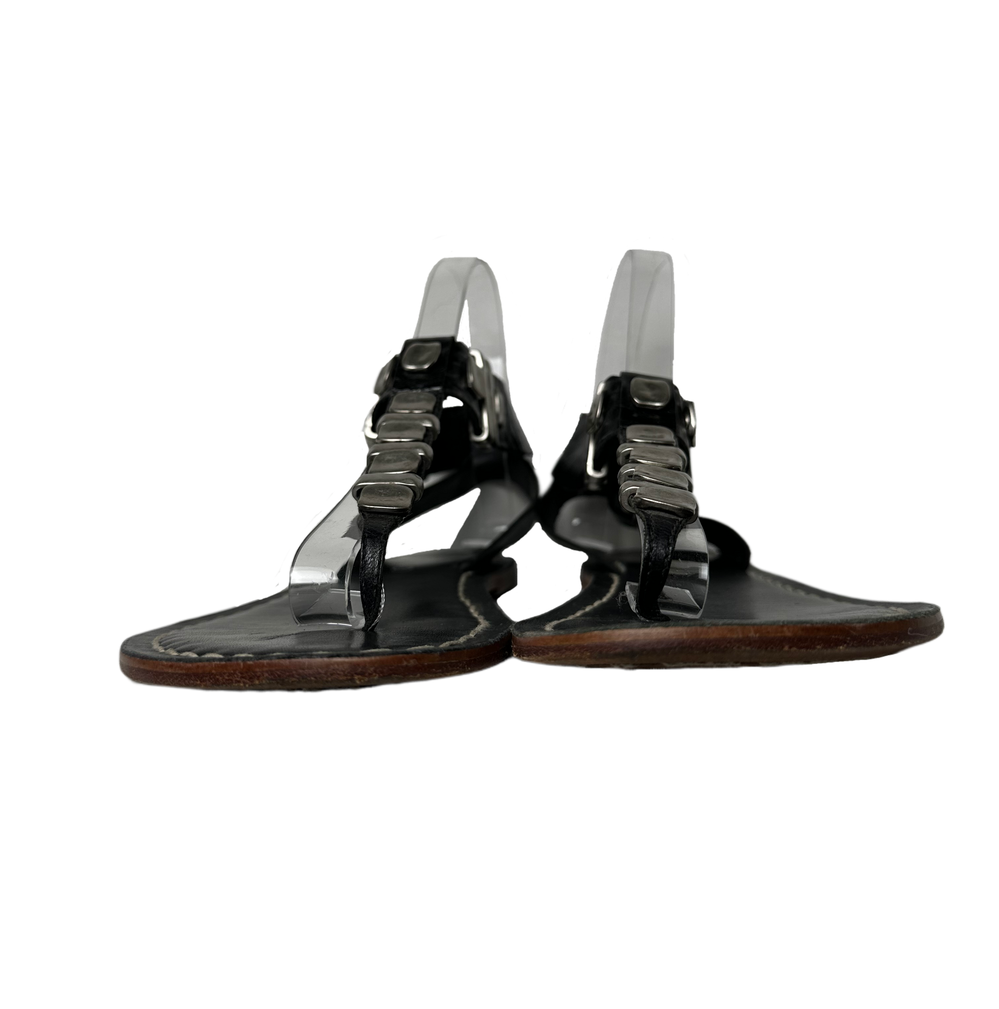 BernardoEmbrace bold style with the Bernardo Milan sandal! Crafted from smooth leather and featuring chunky silver metal accents, these T-strap sandals will inspire your advShoesBernardo Milan Flat T-strap Black Leather Sandal-strap Black Leather Sandal