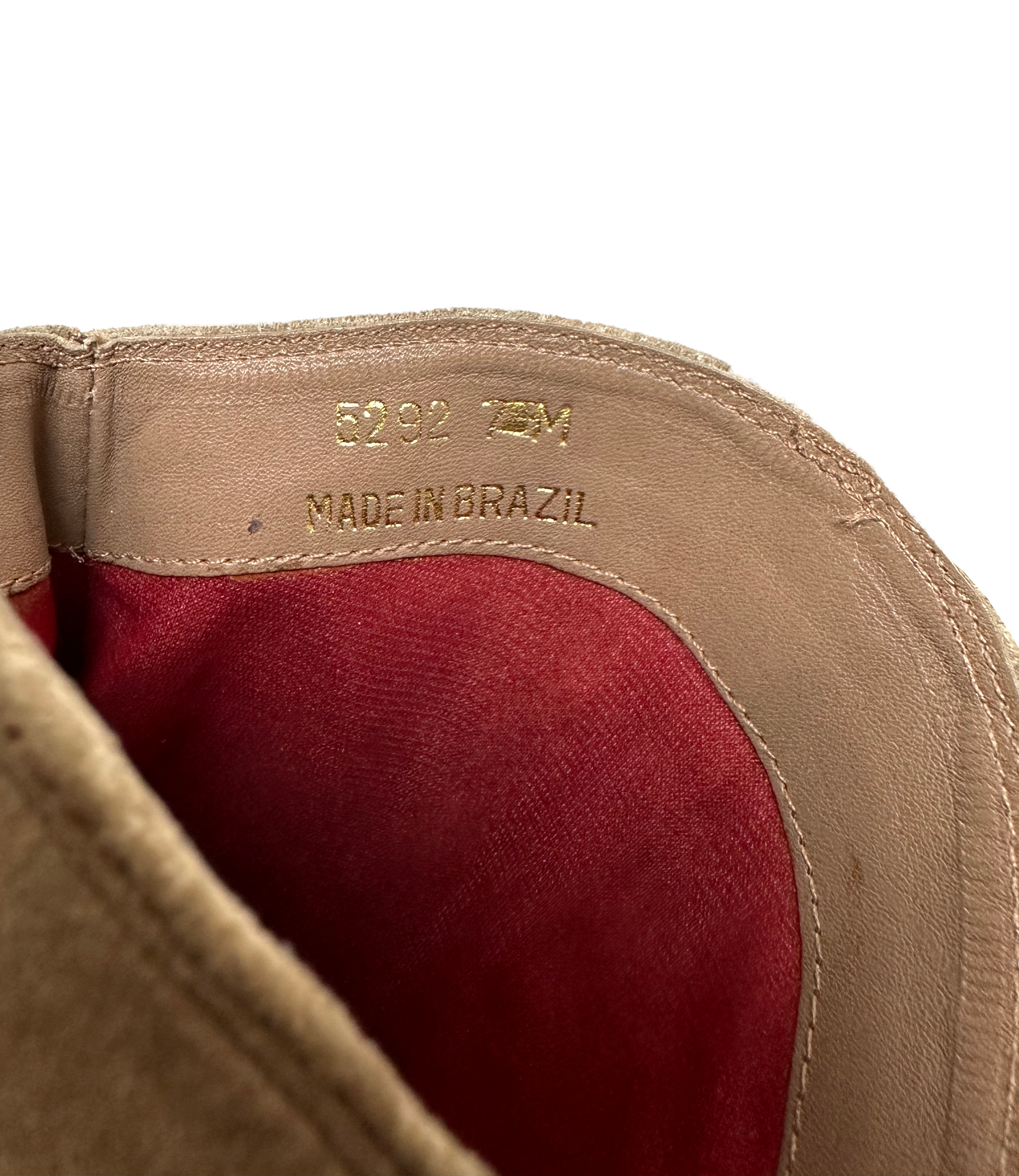 Etienne Aigner Vintage Tan Suede Boots Size 7 Score a vintage find with these well-loved Etienne Aigner boots. Made in Brazil with supple suede, they're the perfect