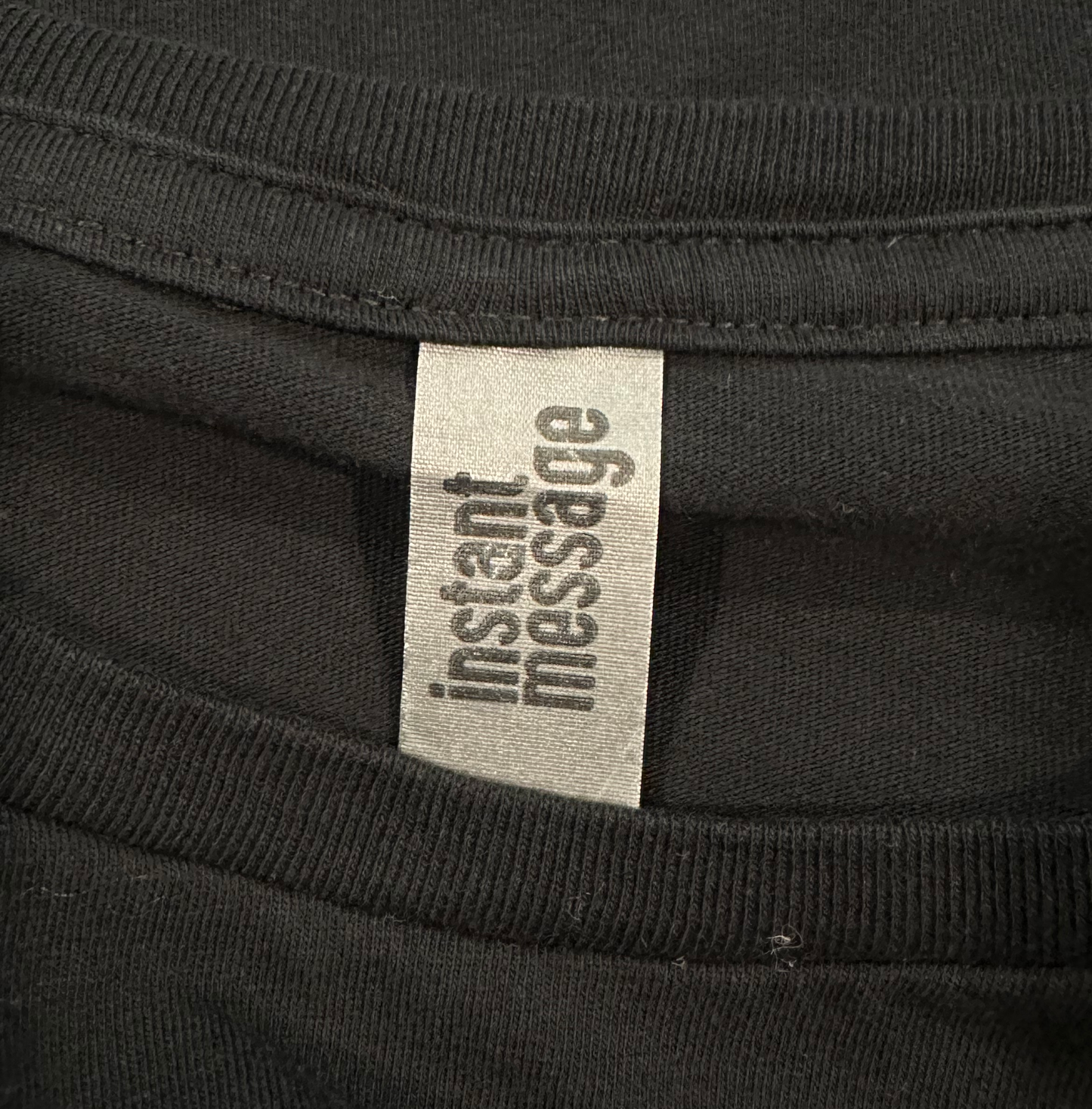 Instant Message Instant Message Black T-Shirt with White Daisy Print! This comfortable style is perfect for a laid-back outfit, with its classic short sleeves, crew neck, and chShirts & TopsInstant Message Black T-Shirt with White Daisy PrintInstant Message Black