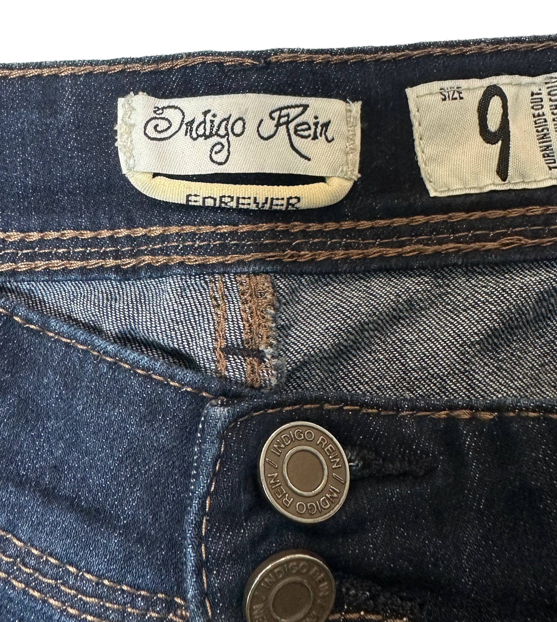 Indigo Rein ForeverBe a denim darling in these Indigo Rein Forever shorts! From the distressed dark wash to the longer style with cuffs, these bad boys are like a love letter to classiShortsIndigo Rein ForeverIndigo Rein Forever