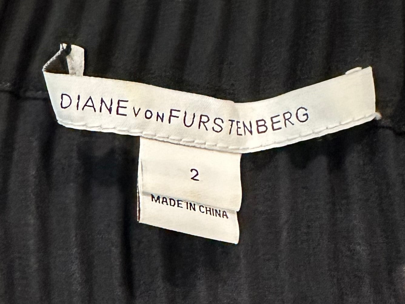 Diane Von Furstenberg Mikino Pleated Neckline Blou The stunning Diane Von Furstenberg Multi Color Printed Mikino Pleated Neckline Blouse is the perfect way to make a statement with artfully-crafted chiffon creating a