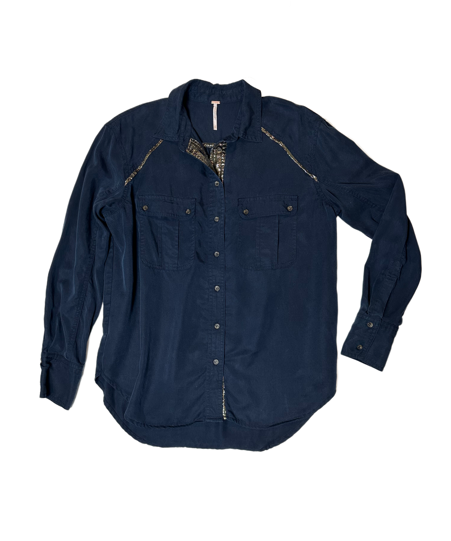 Free PeopleThis Free People midnight blue blouse is the perfect choice for an evening look with a twist! The tencel fabric is soft and light, while the shimmer trim provides a ShirtFree People Midnight Blue Button Front Blouse with Shimmer TrimFree People Midnight Blue Button Front Blouse