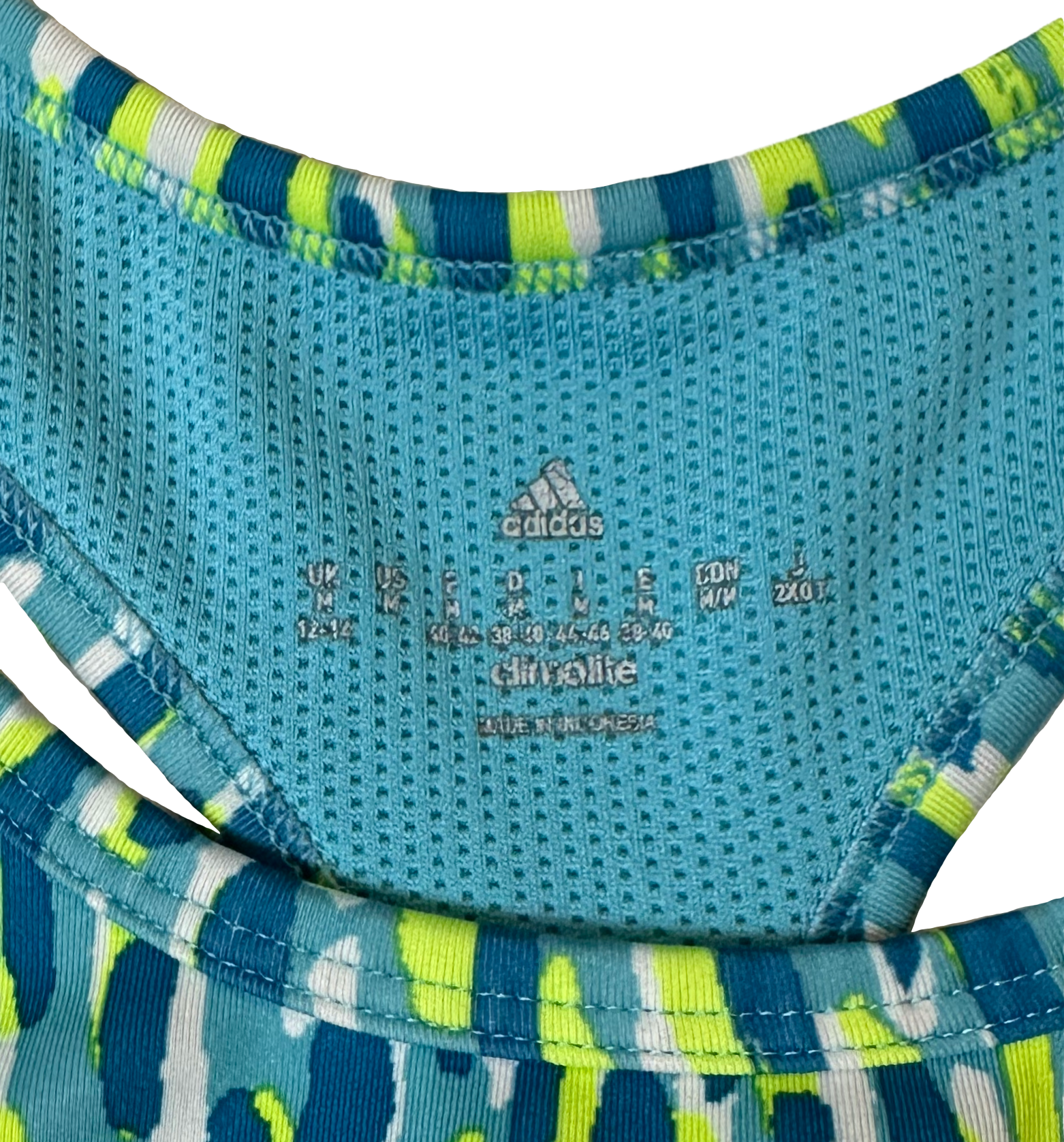 Adidas Blue & Green Print Twist Look Back Sports Bra Size Medium Get ready to twist and shout in this Adidas blue & green sports bra! Featuring a unique twist look b