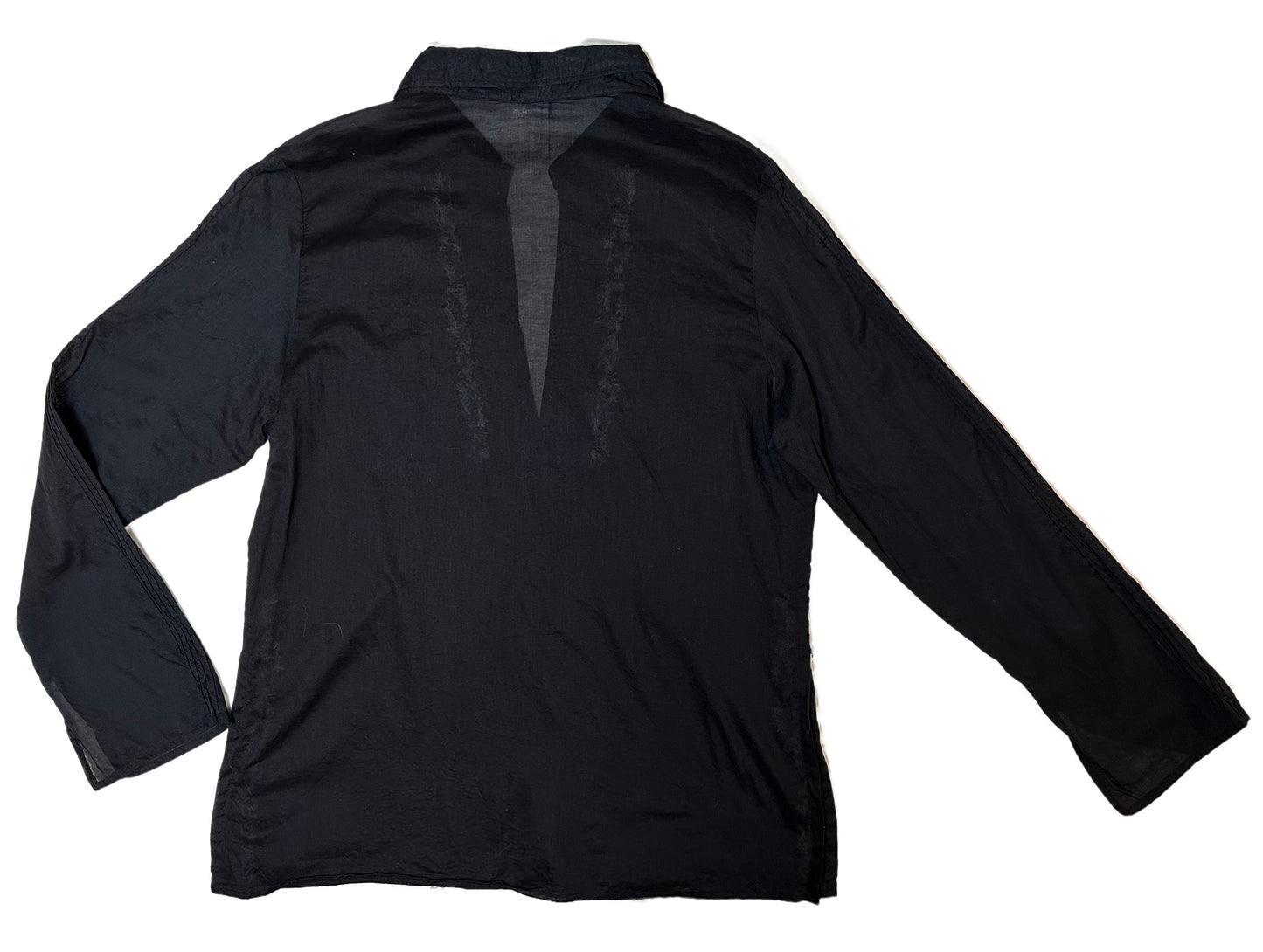 Karen KaneEnhance your wardrobe with this timelessly chic Karen Kane blouse. Delicately crafted from 100% cotton, its split collar and cuffs lend a relaxed elegance, while theBlouseKaren Kane Black Semi Sheer Boho Blouse with Embroidery DetailsKaren Kane Black Semi Sheer Boho Blouse