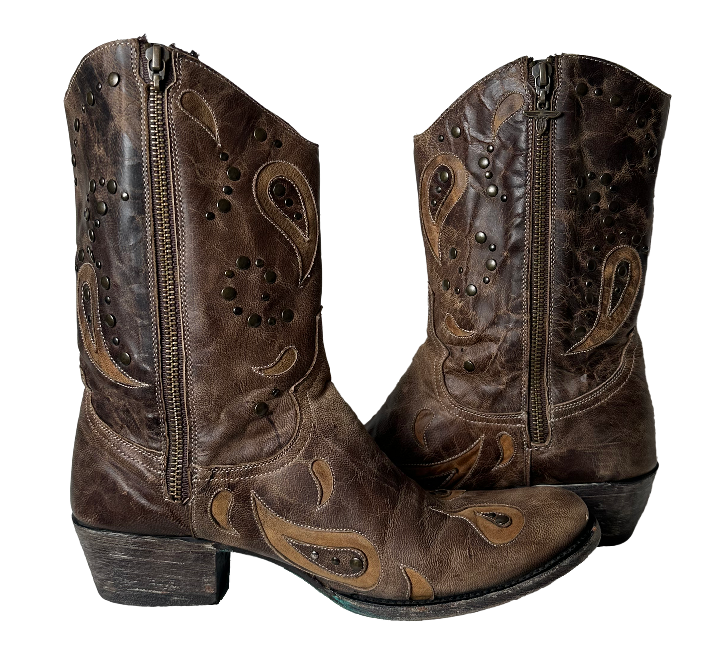Lane Boots Brown with Cut-Outs, Studs and Side Zips Cowboy Cowgirl Slip into these Lane Boots with ease thanks to the convenient side zips, while the round toe and l