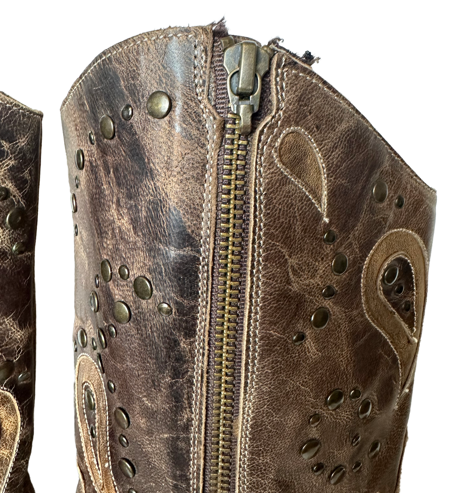 Lane Boots Brown with Cut-Outs, Studs and Side Zips Cowboy Cowgirl Slip into these Lane Boots with ease thanks to the convenient side zips, while the round toe and l