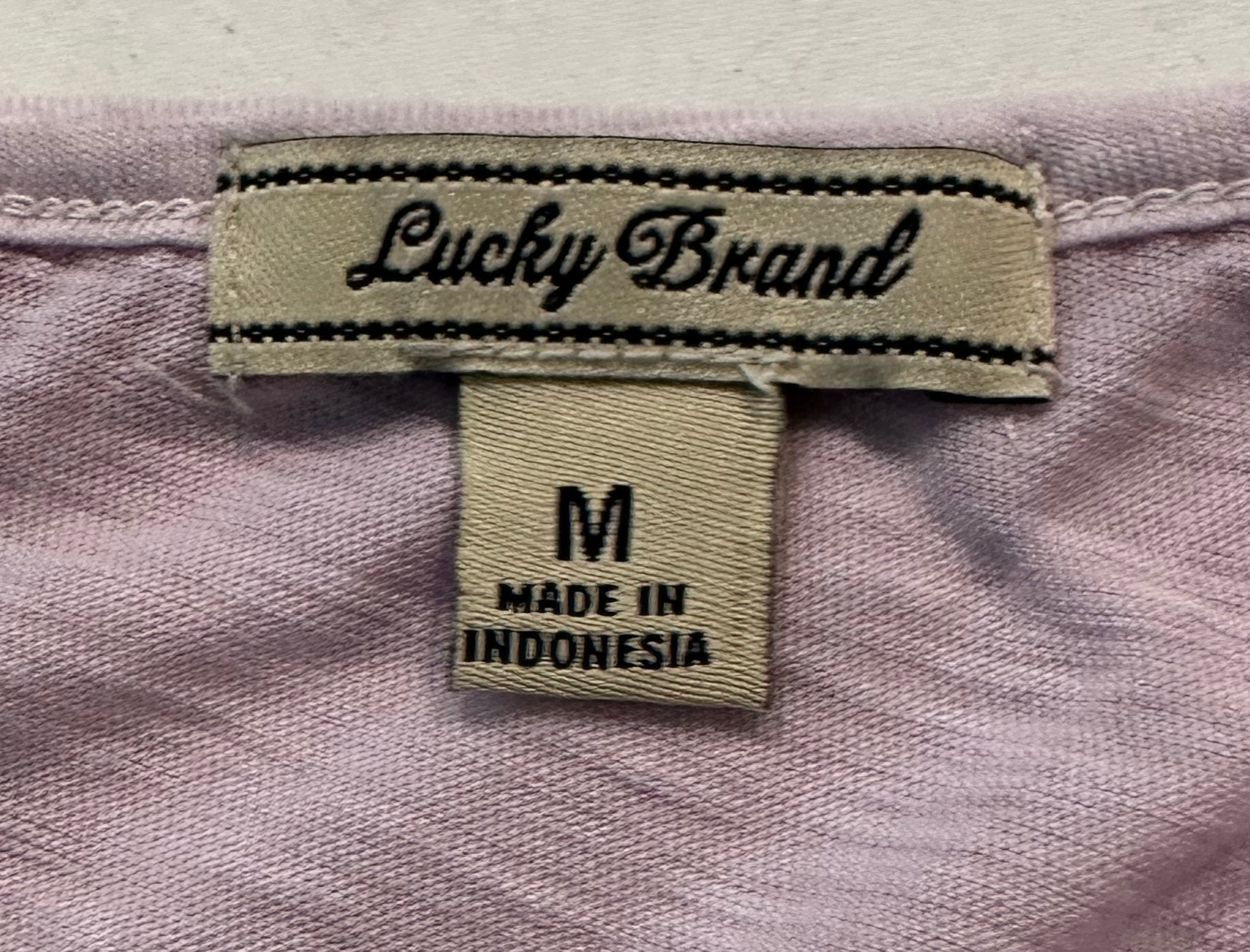 Lucky BrandThis Lucky Brand top is the perfect warm-weather wardrobe staple, crafted from a light lavender fabric with cold shoulder cutouts and short flutter sleeves. Brass buShirts & TopsLucky Brand Cold Shoulder Short Flutter Sleeve Lavender TopLucky Brand Cold Shoulder Short Flutter Sleeve Lavender Top
