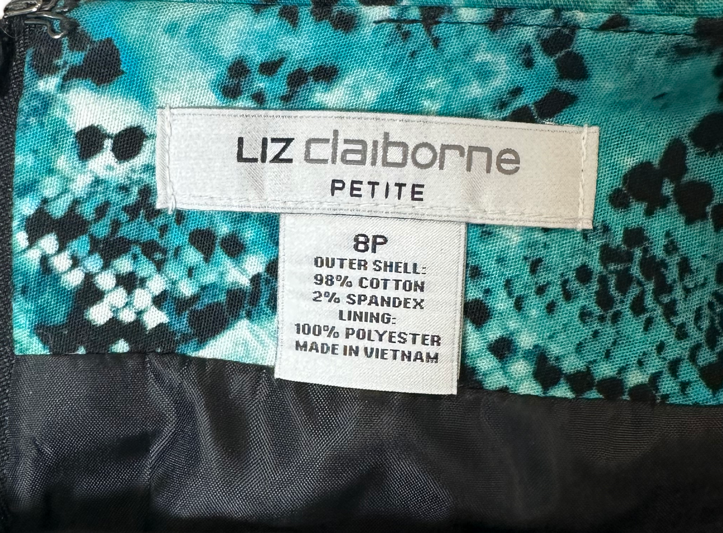 Liz ClaiborneBreak out of your style rut with this Liz Claiborne pencil skirt! Sleek and sophisticated, it's made of soft fabric and features a wild teal snake skin print. Fully SkirtsLiz Claiborne Teal Snake Skin Print Pencil SkirtLiz Claiborne Teal Snake Skin Print Pencil Skirt