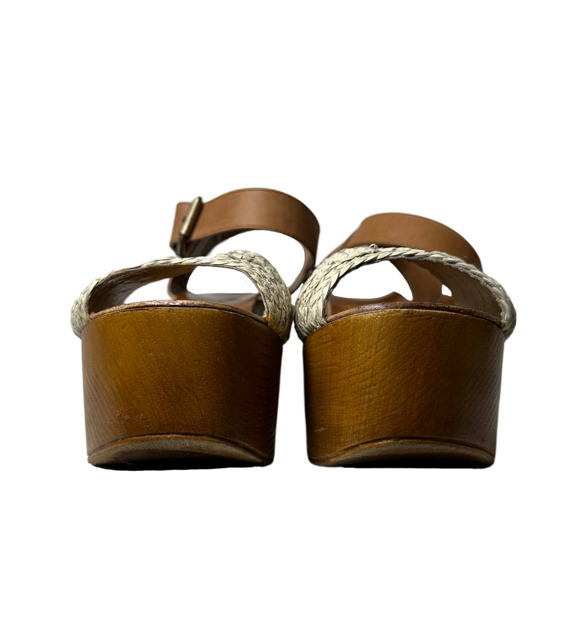 MiaThese Mia platform wood heel shoes boast a stylish look with an off-white crochet-like band and brown leather ankle strap. The wood platform heel adds fashion intereShoesMia Platform Wood Heel Shoes with "Crochet" BandMia Platform Wood Heel Shoes