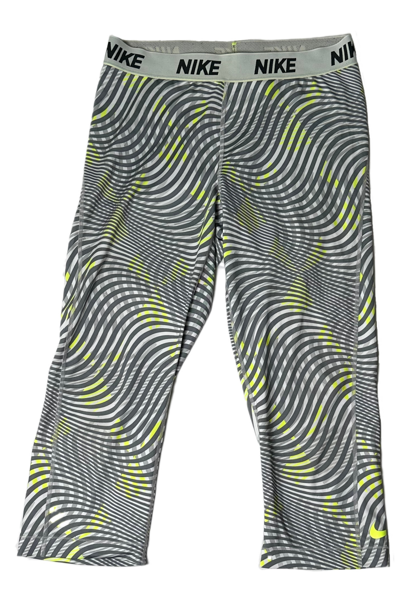 NikeTear through your workout with these Nike Dri Fit cropped leggings! Made with a sleek grey and lime green swirl print, these moisture-wicking leggings will make sureLeggingsNike Dri Fit Cropped Grey Print LeggingsNike Dri Fit Cropped Grey Print Leggings