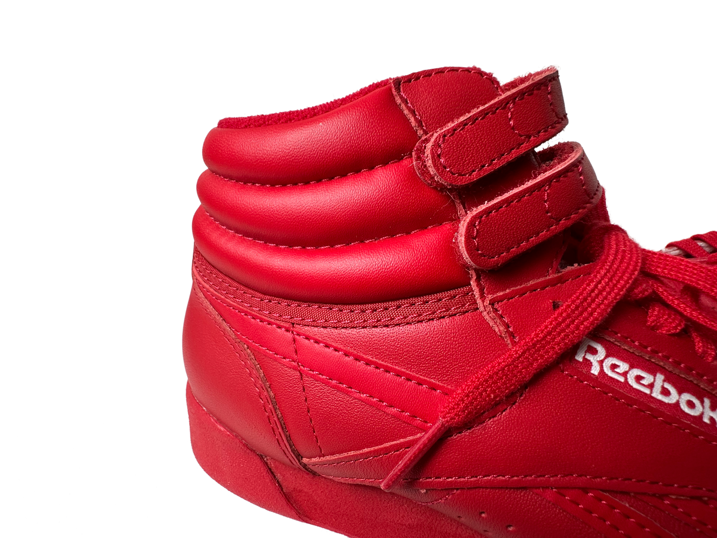 Reebok Women’s Freestyle Hi M43399 Red Leather Shoes Sneakers Size 7.5 Add some fiery fun to your shoe collection with these red hi-top sneakers. With a retro design
