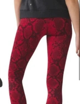LululemonThese Lululemon red snake print leggings are the perfect way to add a touch of sophisticated edge to your activewear. Crafted in luxuriously comfortable fabric adornLeggingsLululemon Red Snake Print LeggingsLululemon Red Snake Print Leggings