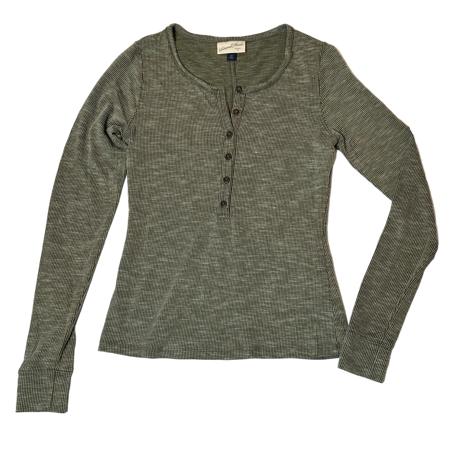 Universal ThreadsThis long-sleeve henley thermal from Universal Threads will keep you feeling cozy and looking cool! Crafted with a soft, moss-green fabric and classic henley style, TopUniversal Threads Moss Green Long Sleeve Henley ThermalUniversal Threads Moss Green Long Sleeve Henley Thermal