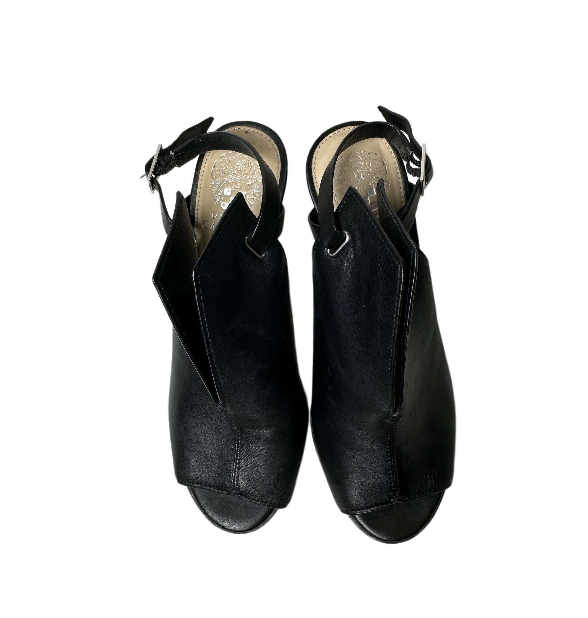 Vince Camuto Black Leather Sling Back Mules provide a statement-making look with their sleek, sophisticated design featuring a peep toe, leather upper and stilShoesVince Camuto Black Leather Sling Back MulesVince Camuto Black Leather Sling Back Mules