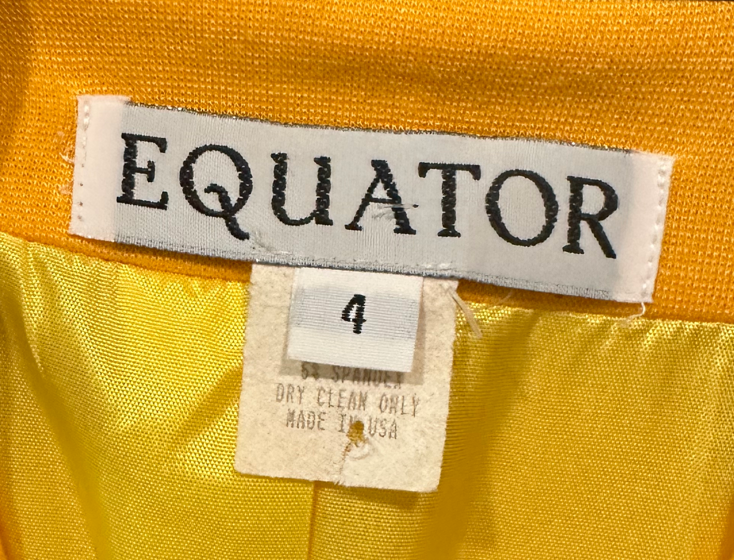 Equator Yellow Structured Vintage Jacket with Black Collar from Equator gives a classic look with its structured design and black collar. Zip front pockets offer convenient storage and giveJacketEquator Yellow Structured Vintage Jacket with Black CollarEquator Yellow Structured Vintage Jacket