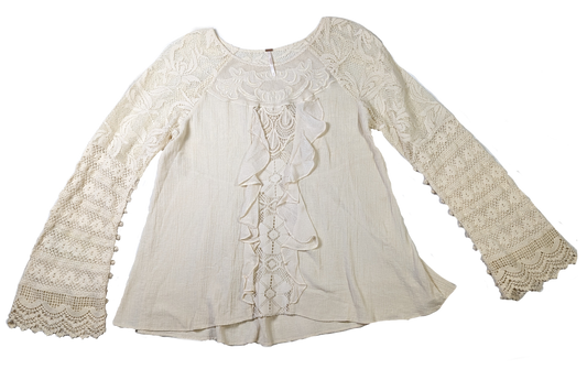 Free People Lace and Crochet TopThis Free People top is a beautiful combination of lace and crochet detail, creating a one-of-a-kind boho look. Crafted with 100% Cotton, the ruffle detail and croch