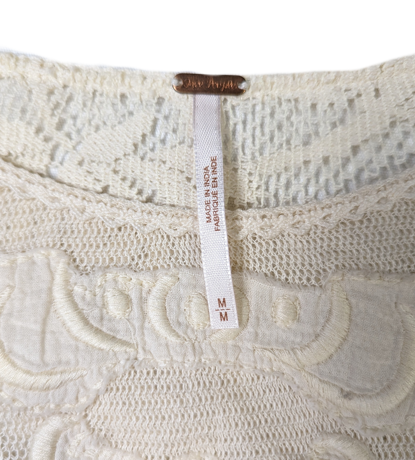 Free People Lace and Crochet TopThis Free People top is a beautiful combination of lace and crochet detail, creating a one-of-a-kind boho look. Crafted with 100% Cotton, the ruffle detail and croch