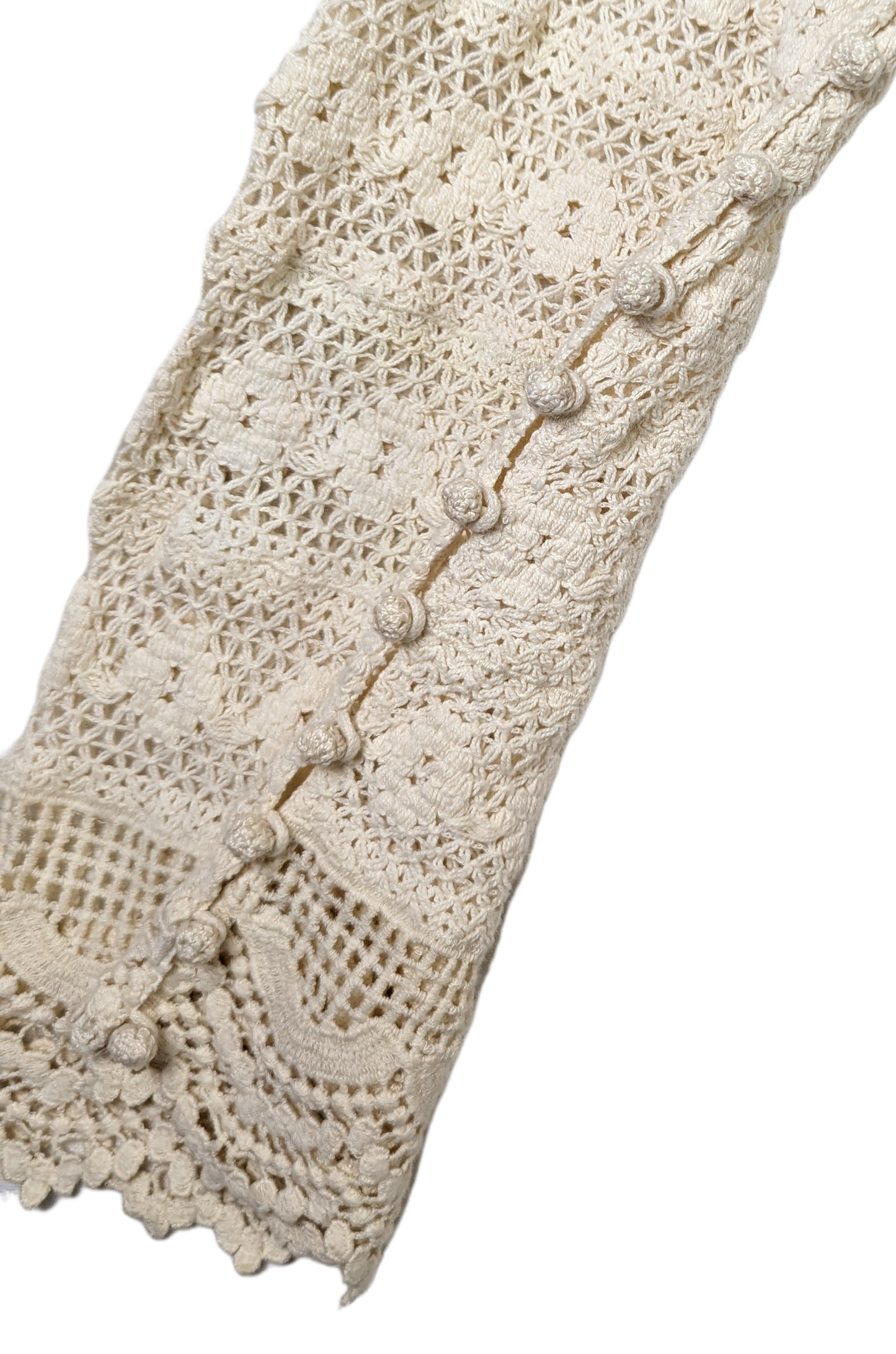Free People Lace and Crochet TopThis Free People top is a beautiful combination of lace and crochet detail, creating a one-of-a-kind boho look. Crafted with 100% Cotton, the ruffle detail and croch