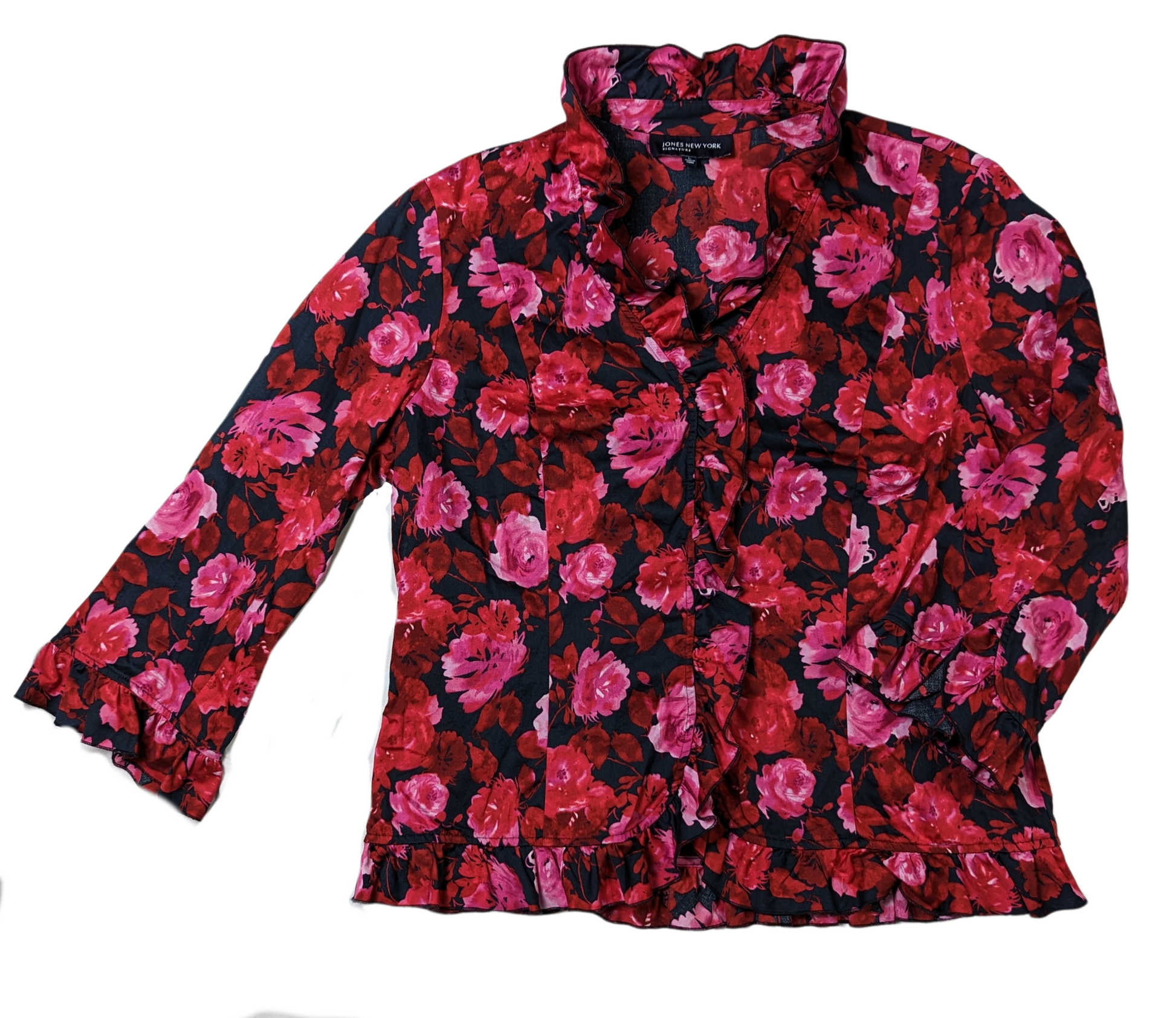 Jones New York SignatureLook your best in the Jones New York Ruffle Neck Blouse! With a black base and a pink and red floral print, this blouse is perfect for making a statement. The ruffleBlouseJones New York Ruffle Neck BlouseYork Ruffle Neck Blouse