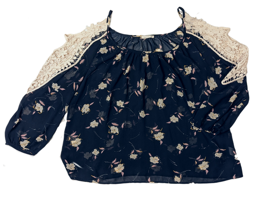 SopranoLive your life in full bloom with this captivating, navy floral blouse. Its cold-shoulder, crochet lace, and sheer fabric give a glam girly feel that's perfect for wShirts & TopsSoprano Cold Shoulder Floral BlouseSoprano Cold Shoulder Floral Blouse
