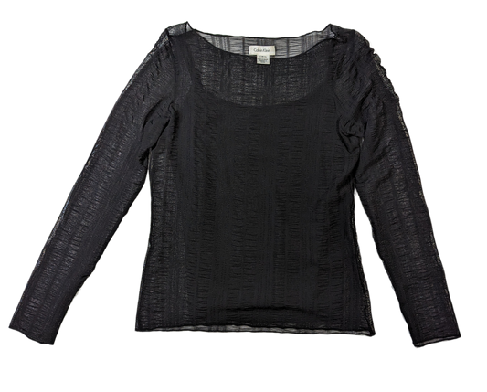 Calvin Klein Long Sleeve Sheer Top Calvin Klein's Long Sleeve Sheer Top offers a sleek, timeless option for any wardrobe. Crafted with a subtle ruching effect in the sheer layer and an attached tank l