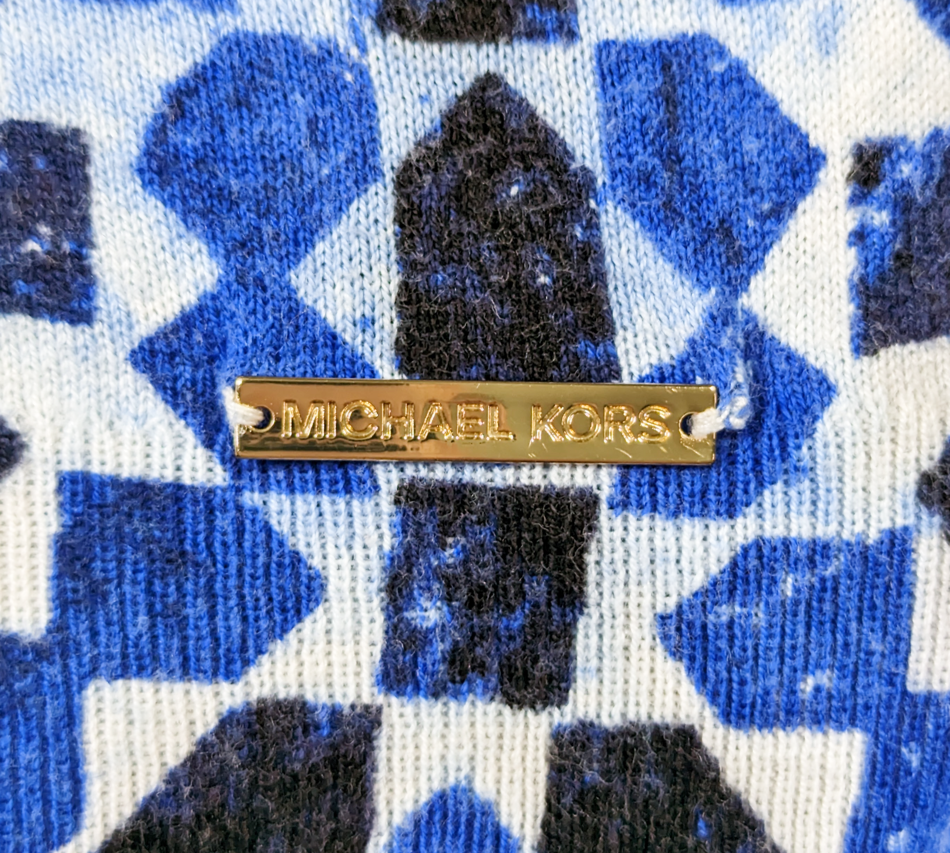 Michael KorsThe Michael Kors Kaleidoscope Print Sweater is a lightweight knit garment perfect for transitional weather. Its vivid kaleidoscope print adds a statement-making toucSweaterMichael Kors Kaleidoscope Print SweaterMichael Kors Kaleidoscope Print Sweater