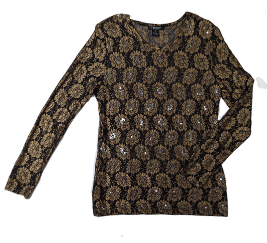 Karen Kane Black and Gold Beaded TopThis Karen Kane top is a stylish and sophisticated choice for any wardrobe. Its intricate black and gold lace design is paired with a luxuriously soft feel that make