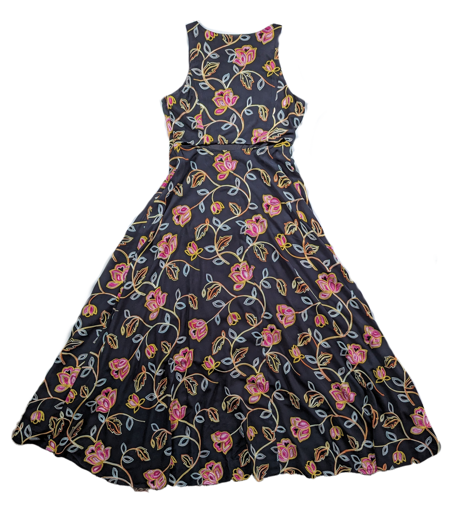Nicole Miller Black Embroidered High-Low DressLovely embroidered dress from Nicole Miller features a high-low hemline, side-zip and a cut-out back.  Colorful floral embroidery is set against a black background tNicole Miller Black Embroidered High-Low DressDresses