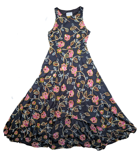 Nicole Miller Black Embroidered High-Low DressLovely embroidered dress from Nicole Miller features a high-low hemline, side-zip and a cut-out back.  Colorful floral embroidery is set against a black background tNicole Miller Black Embroidered High-Low DressDresses