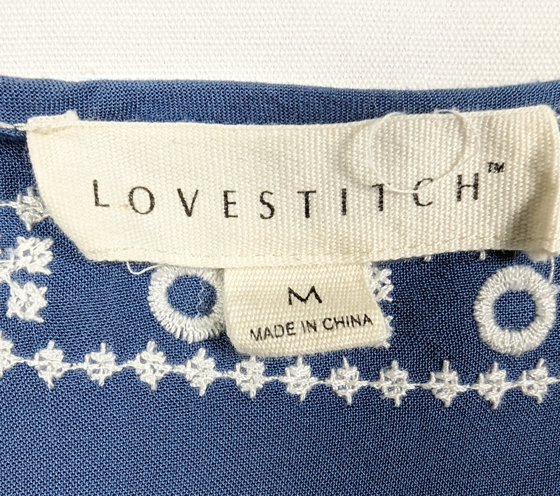 Lovestitch Blue Embroidered Mini Dress The bell sleeves add style and flair.DressesLovestitch Blue Embroidered Mini DressLovestitch Blue Embroidered Mini Dress