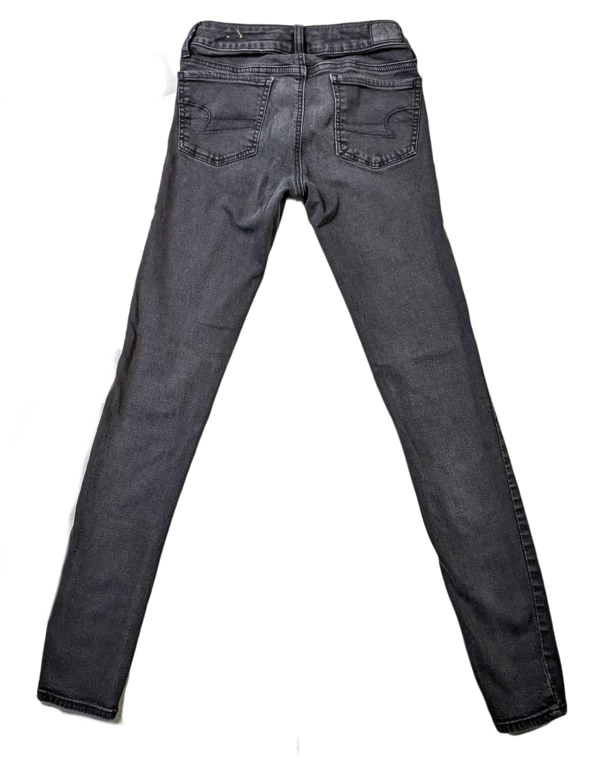 American Eagle Skinny Super Stretch Black Denim JeanSuper Stretch and Super Skinny.  Also, super long!