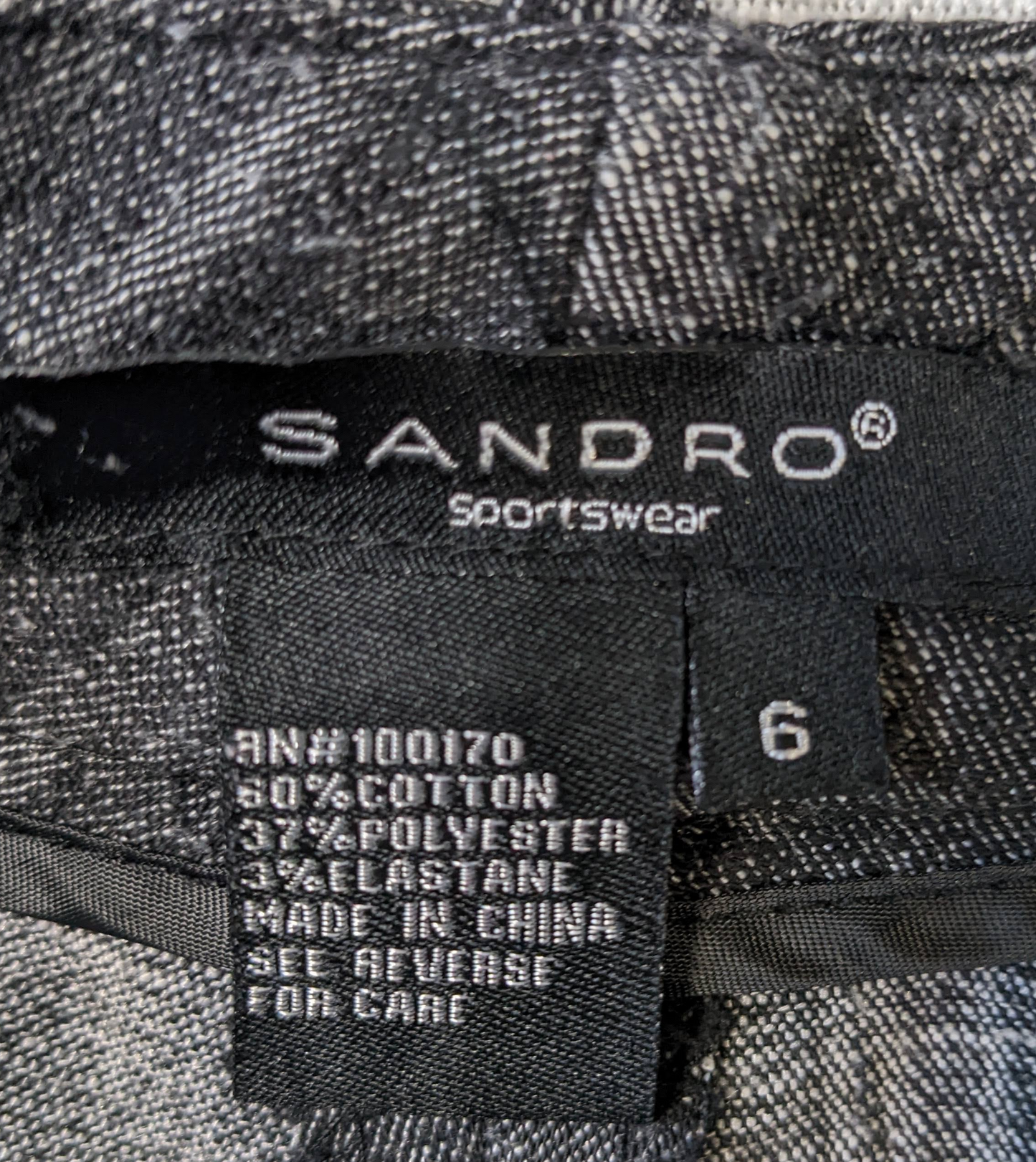 Sandro Sportswear Dress pantsThese are beautifully woven pants, with a mix of black and gray threads. This makes a beautiful neutral pant that you can wear with a variety of tops and jackets.  W