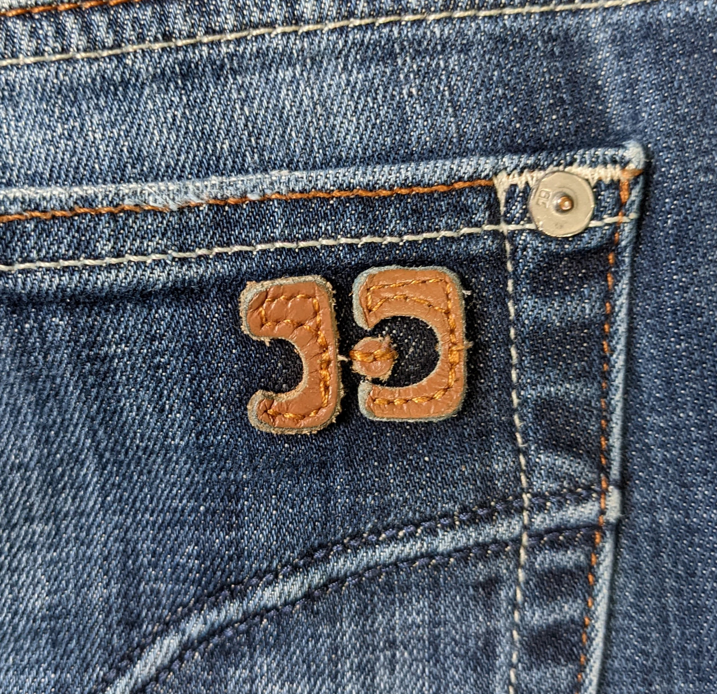 Joe's Jeans Chelsea Fit - repaired beltloopYou can't go wrong with Joe's Jeans! Such great style.  These Jeans had a belt loop that was torn, and we repaired them.  The pictures show the repair job.  They shoJeans Chelsea Fit - repaired beltloopDenim Jeans