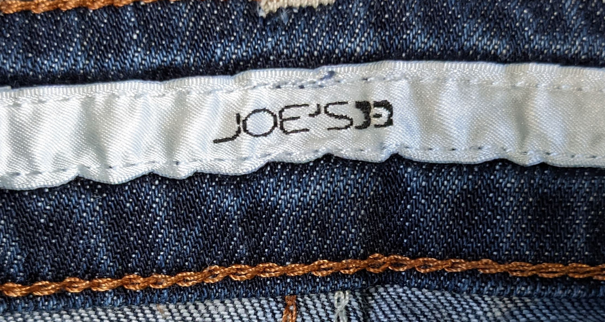 Joe's Jeans Chelsea Fit - repaired beltloopYou can't go wrong with Joe's Jeans! Such great style.  These Jeans had a belt loop that was torn, and we repaired them.  The pictures show the repair job.  They shoJeans Chelsea Fit - repaired beltloopDenim Jeans