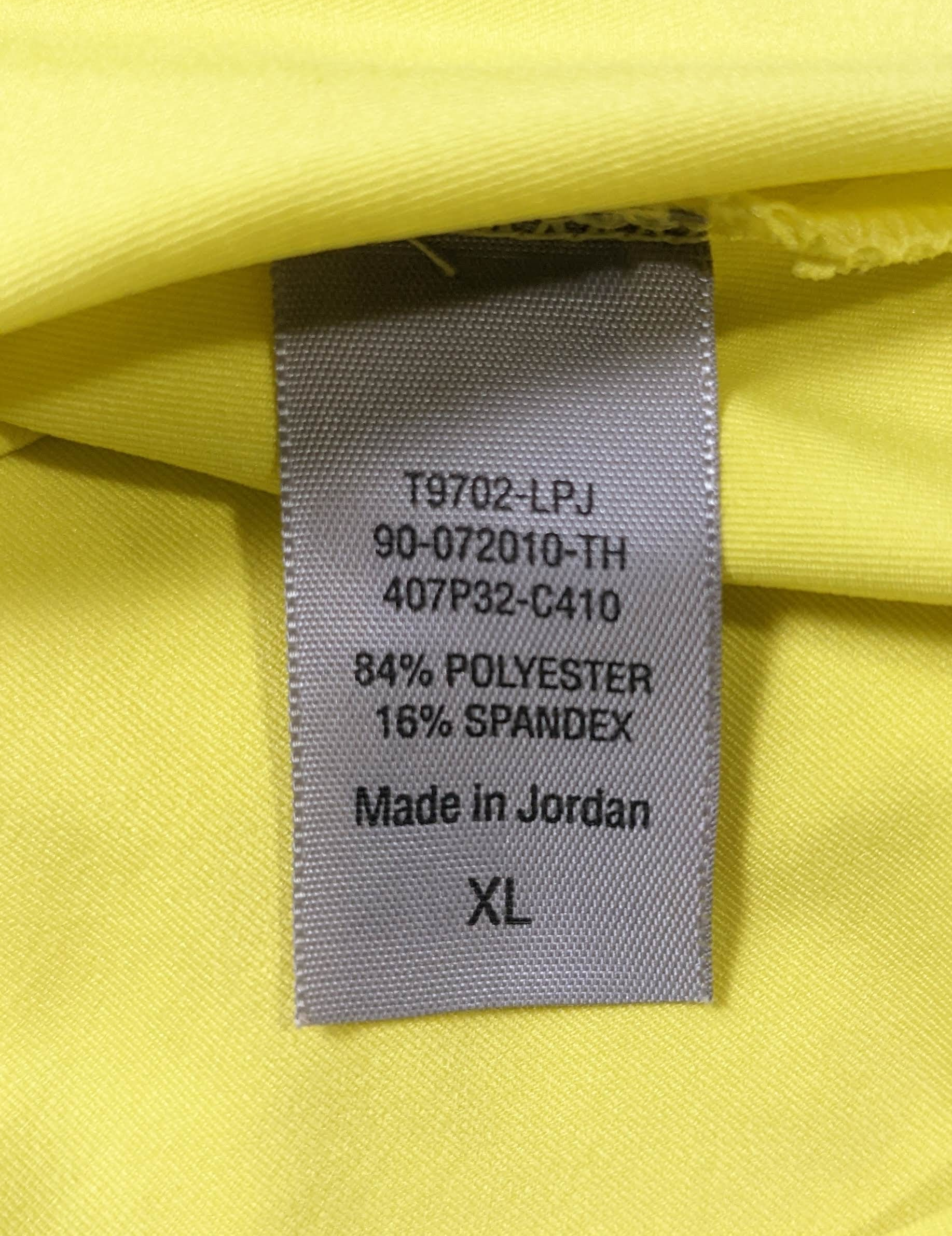 Champion Long Sleeve Activewear Shirt Size XL  Elevate your workouts with the Champion Long Sleeve Activewear Shirt! Move freely and comfortably in this bright yello