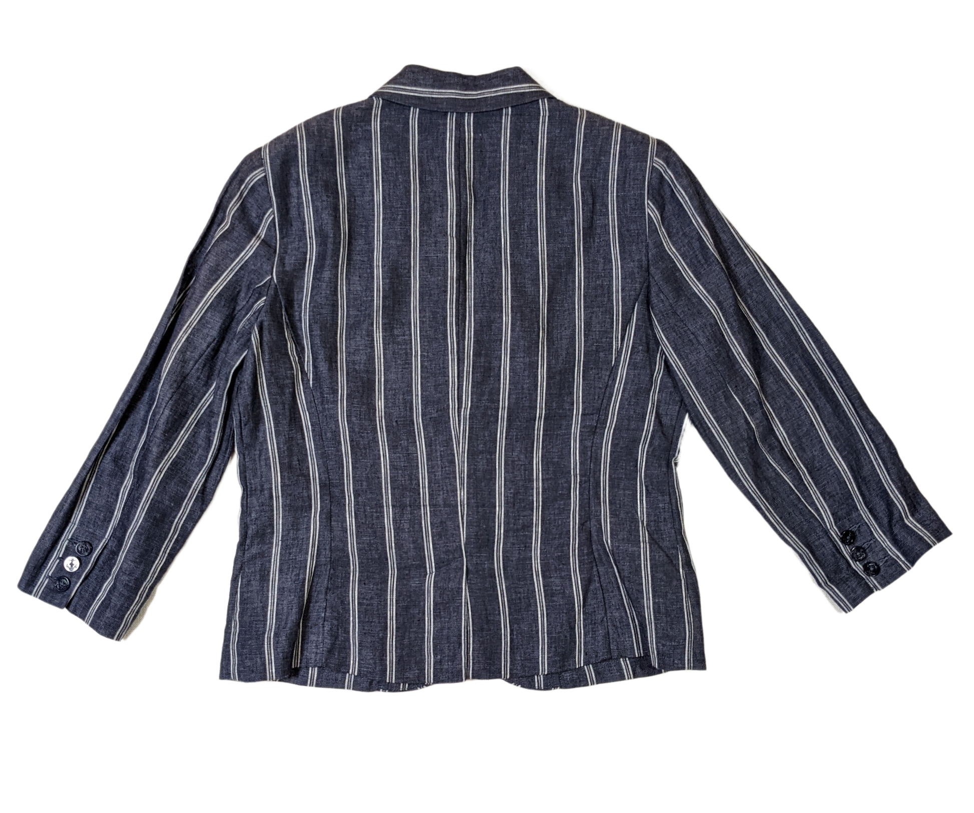CAbi Linen Pinstripe JacketThis Jacket looks sharp with chevron styled pockets and white pinstripes on the blue linen. The 3/4 sleeves give the blazer a relaxed look.
