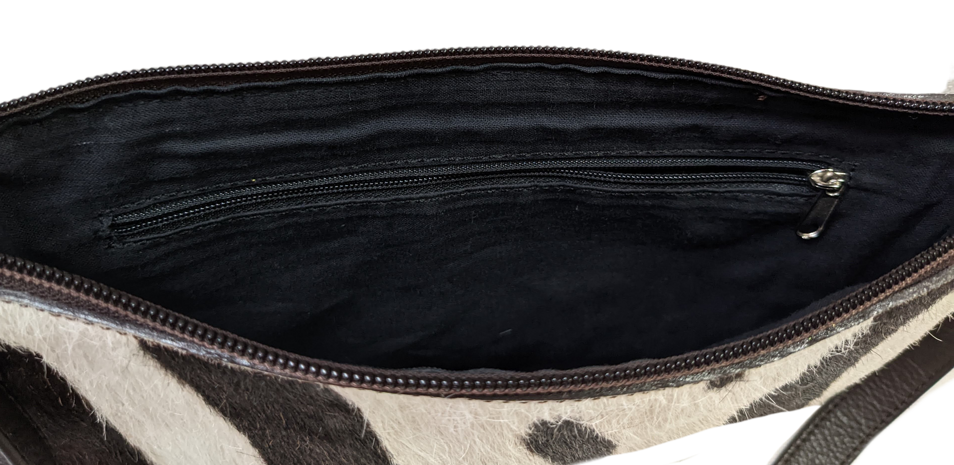 Faux Zebra Hair purse - Unbranded  Unleash your wild side with this faux zebra hair purse! (Just don't tell the real zebras.) Featuring a trendy crossbody design an