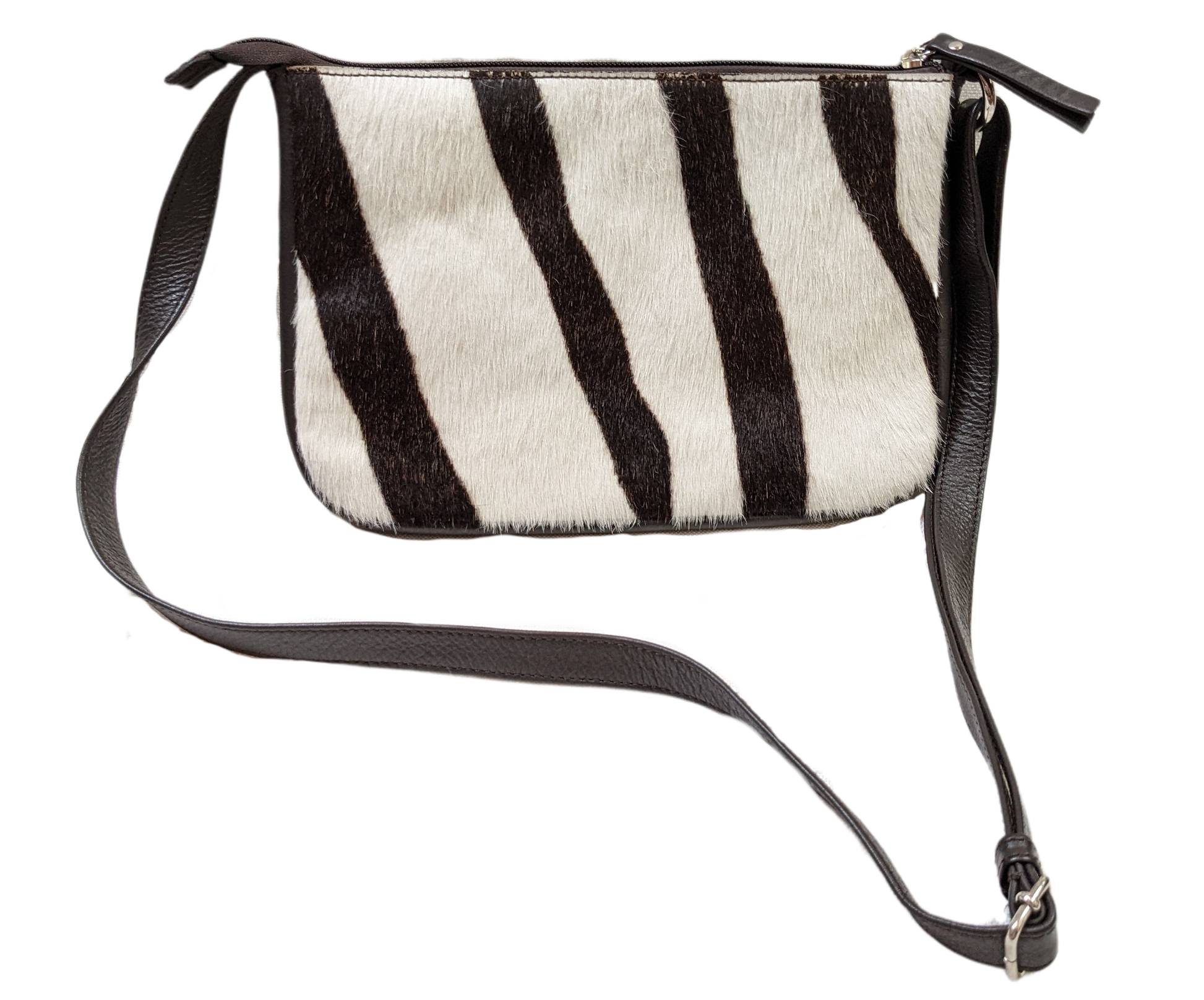 Faux Zebra Hair purse - Unbranded  Unleash your wild side with this faux zebra hair purse! (Just don't tell the real zebras.) Featuring a trendy crossbody design an
