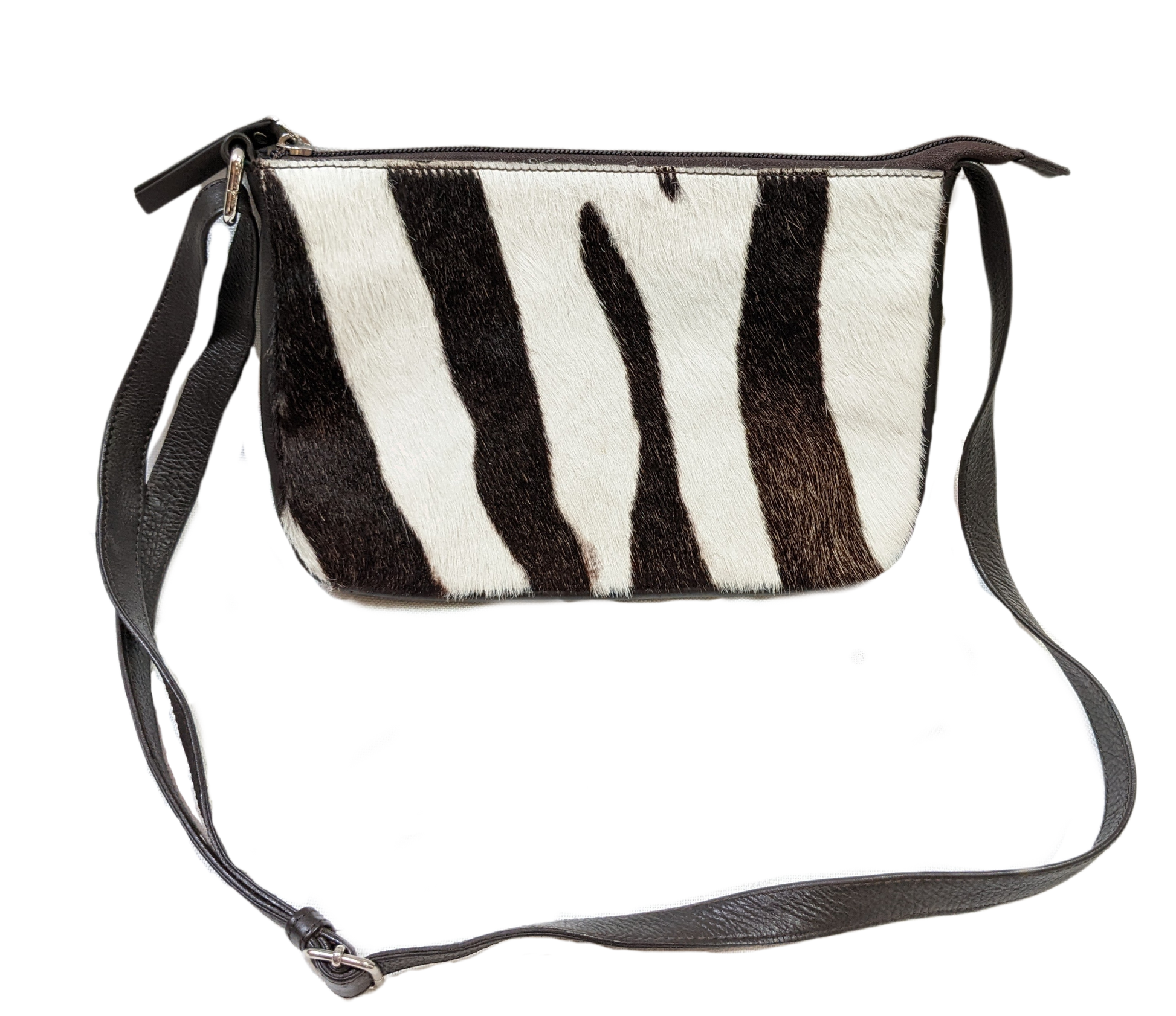 Faux Zebra Hair purse - Unbranded  Unleash your wild side with this faux zebra hair purse! (Just don't tell the real zebras.) Featuring a trendy crossbody design an