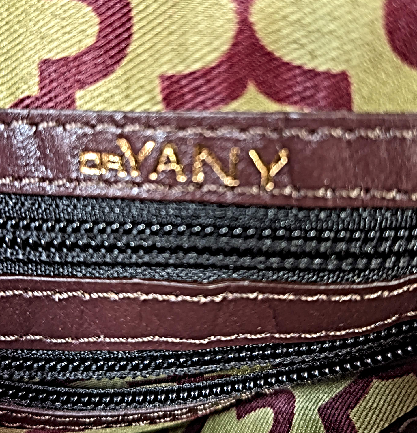 orYany Embossed Leather Handbag Elevate your style with the orYany Embossed Leather Handbag. Crafted with luxurious snake skin embossed leather, this beautiful taupe