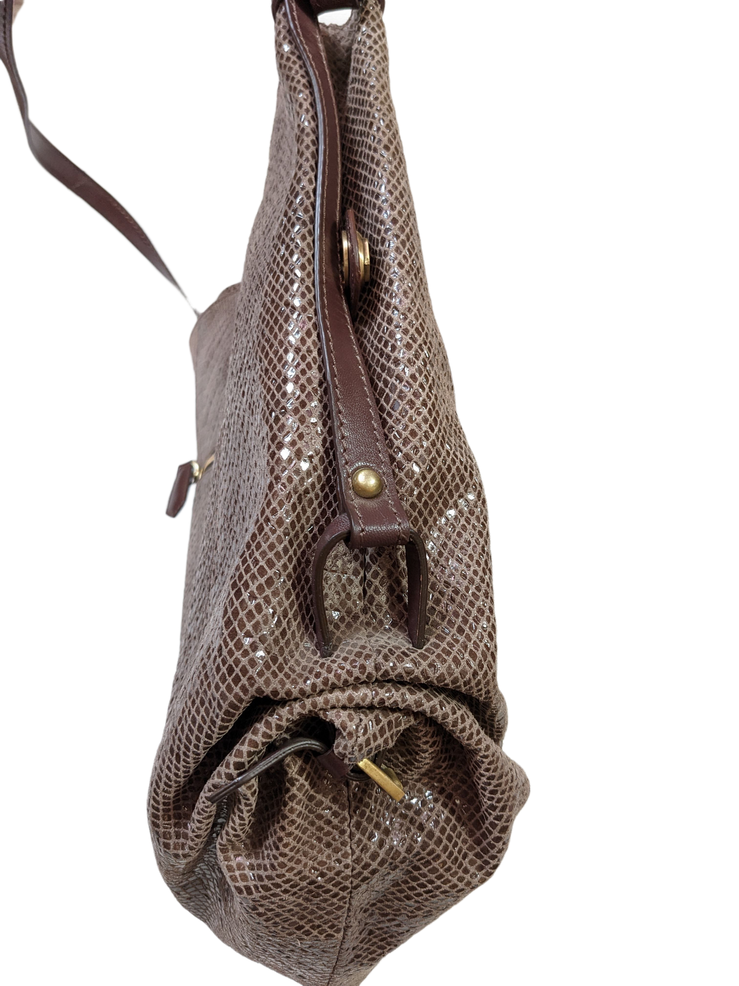 orYany Embossed Leather Handbag Elevate your style with the orYany Embossed Leather Handbag. Crafted with luxurious snake skin embossed leather, this beautiful taupe