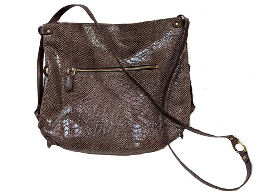 orYany Embossed Leather Handbag Elevate your style with the orYany Embossed Leather Handbag. Crafted with luxurious snake skin embossed leather, this beautiful taupe