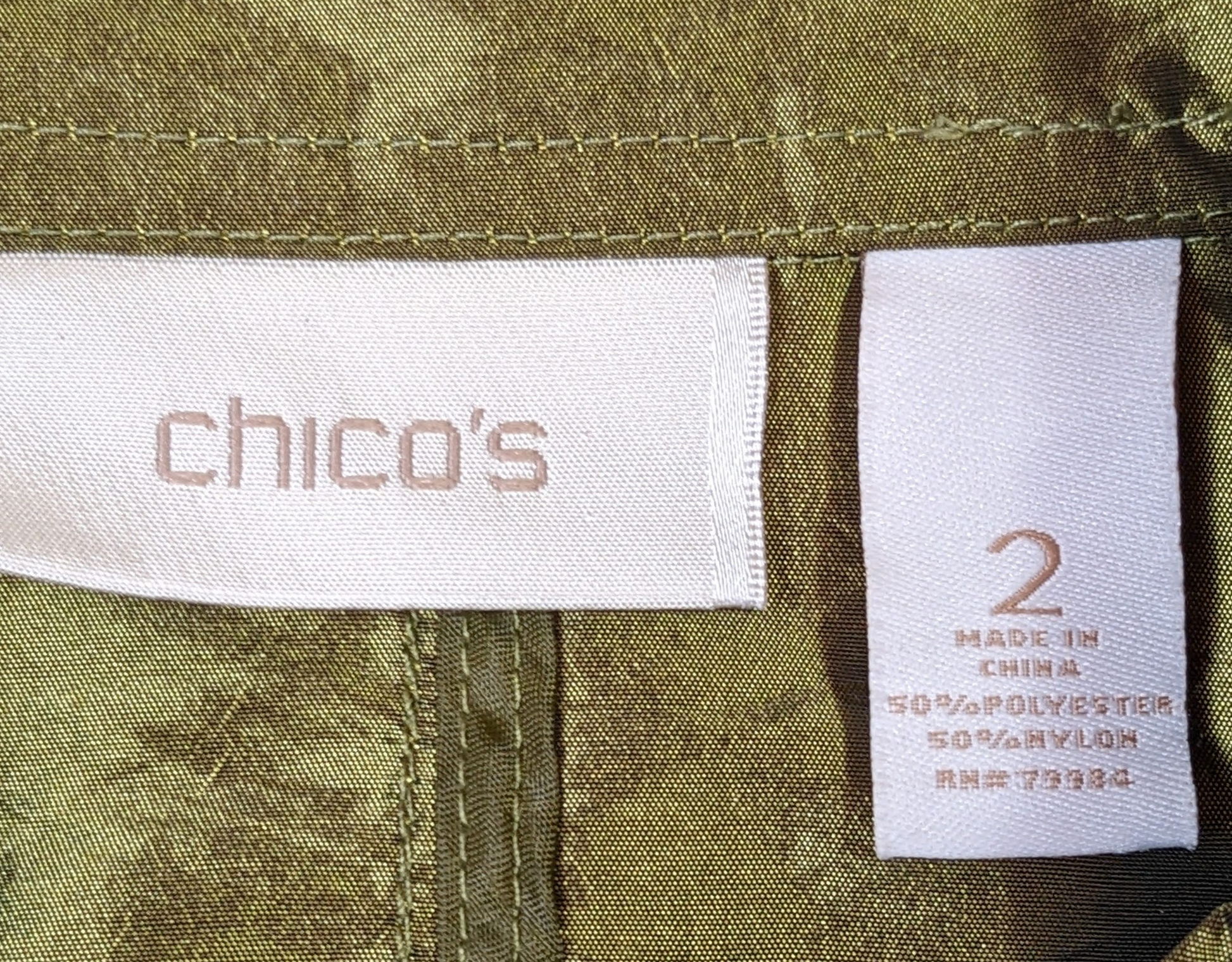Chico's Gorgeous Green Jacket   Experience effortless elegance with Chico's Gorgeous Green Jacket. Made with shimmery, light-weight fabric, this jacket adds a touch