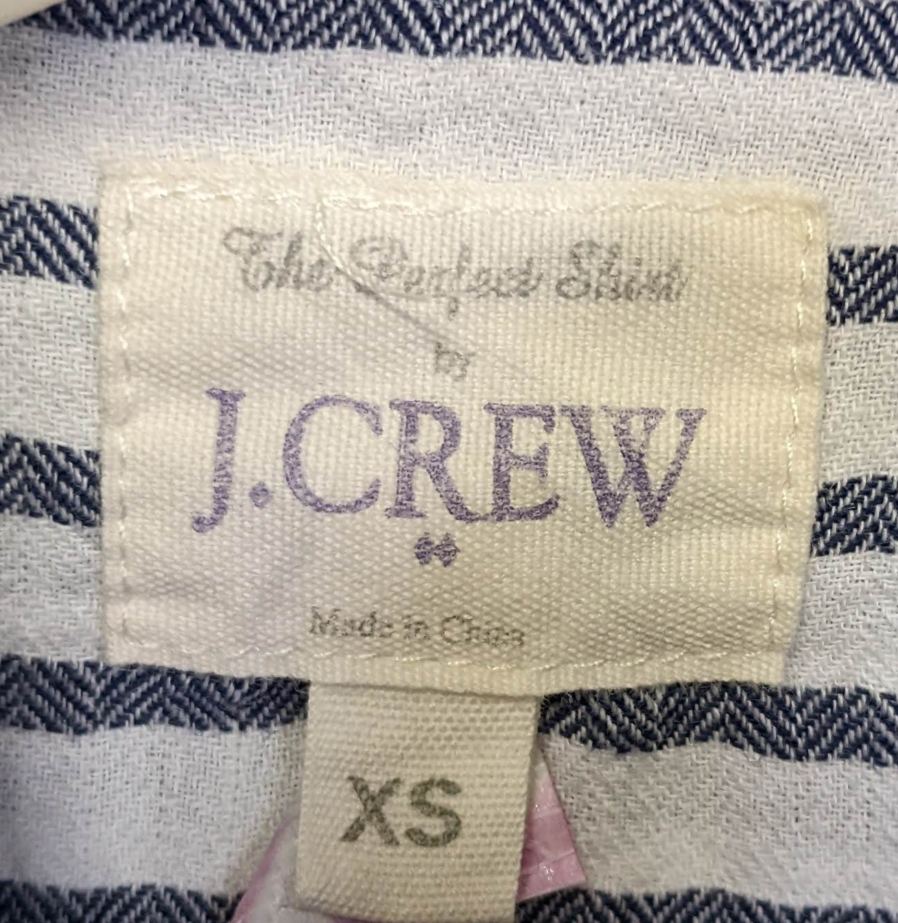 J Crew Blue & White Horizontal Striped Shirt Size XS  Add a touch of classic charm to your wardrobe with this J Crew button-up shirt. The horizontal navy stripes on