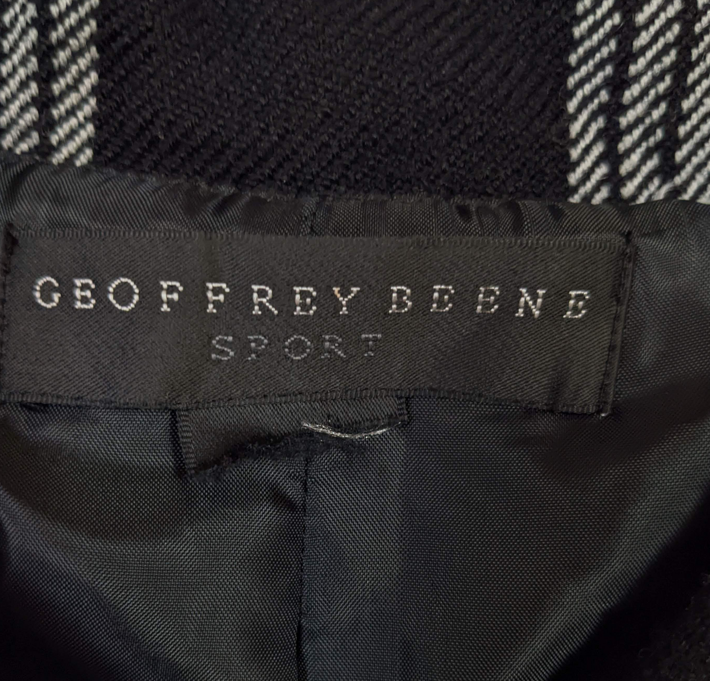 Geoffrey Beene Sport Black Plaid Cropped Jacket You can't miss with a great crop jacket, and this one fits the bill. Great styling with a sideways plaid and a back pleats. Wear this with your favorite jeans or aGeoffrey Beene Sport Black Plaid Cropped JacketCoats & Jackets