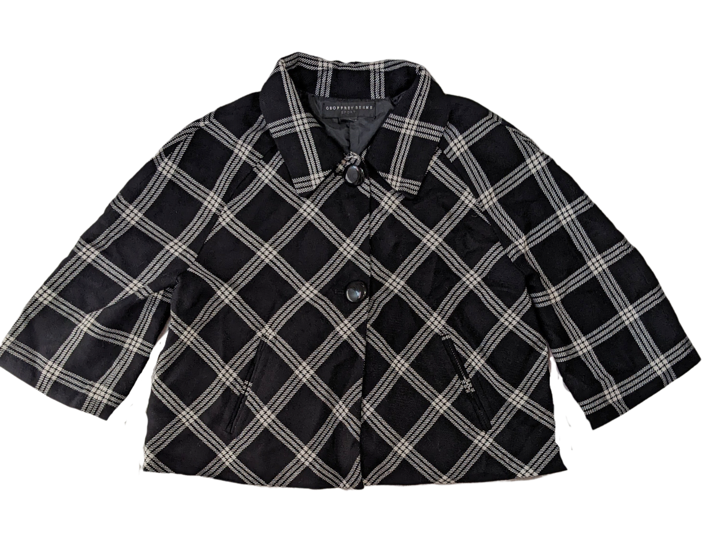 Geoffrey Beene Sport Black Plaid Cropped Jacket You can't miss with a great crop jacket, and this one fits the bill.  Great styling with a sideways plaid and a back pleats.  Wear this with your favorite jeans or aGeoffrey Beene Sport Black Plaid Cropped JacketCoats & Jackets