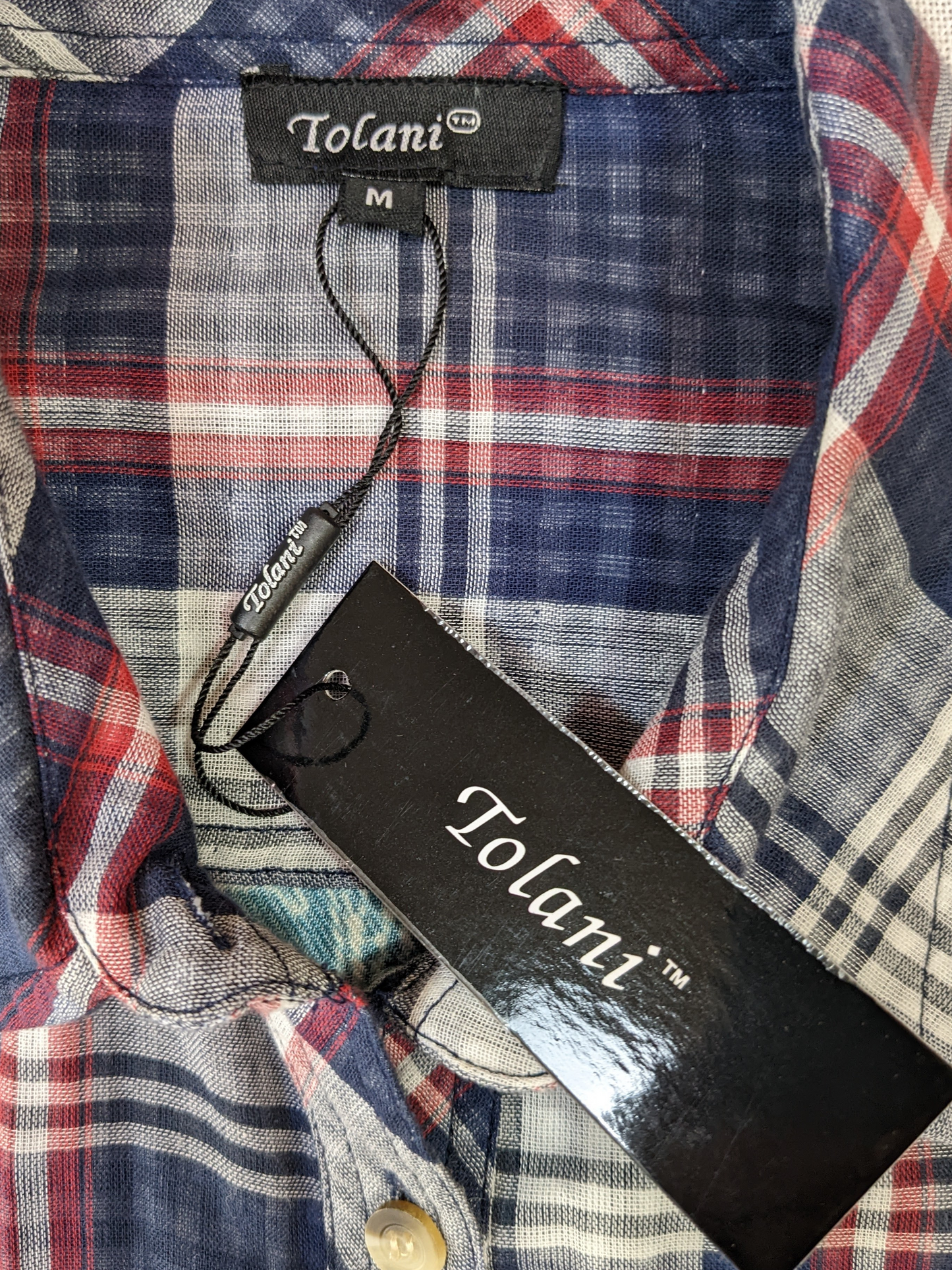 Tolani Navy and Red Plaid Shirt - NWT  Get ready for the perfect mix of edgy and boho with Tolani's navy and red plaid shirt. Featuring a stylish button-up front and