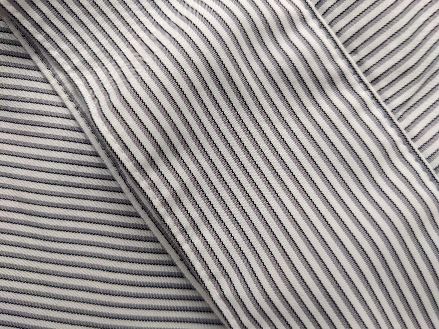 Worthington Button Up White Blouse with Navy Pinstripe Size 1X  Elevate your style with the Worthington Button Up White Blouse. Made with 4% spandex for a comfortable