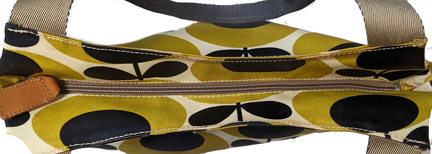 Orla Kiely Rare Mustard Forget-Me-Not Shoulder BagThis bag has such style. It is coated canvas and in excellent condition.  There is some discoloration along the top edge, and on the bottom seam that is detailed in Orla Kiely Rare Mustard Forget-Handbag
