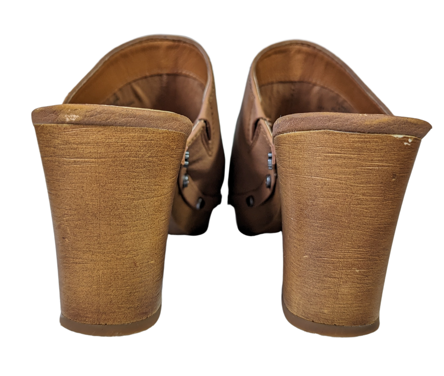 Lucky Brand Platform ClogsWhat a cute pair of clogs!  The detailing of the studs, with different designs on each one, is so stylish.  These work with jeans or skirts, or whatever you want to